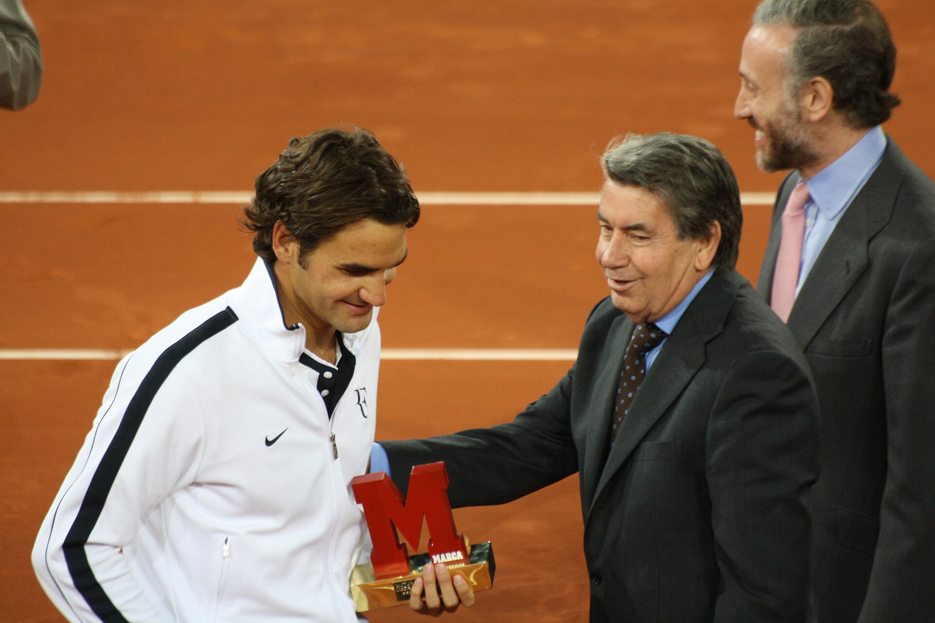 Manolo Santana con Roger Federer